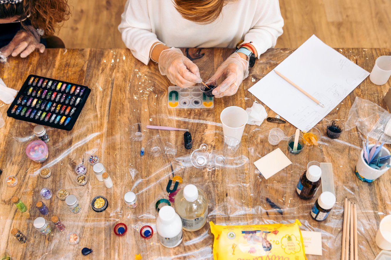 Epoxy jewelry workshop. Epoxy Sparkle: Women Learn Techniques to Make Glamorous Resin Earrings